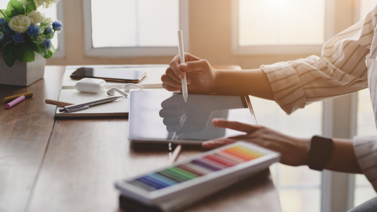 Team planning with sticky notes and laptops